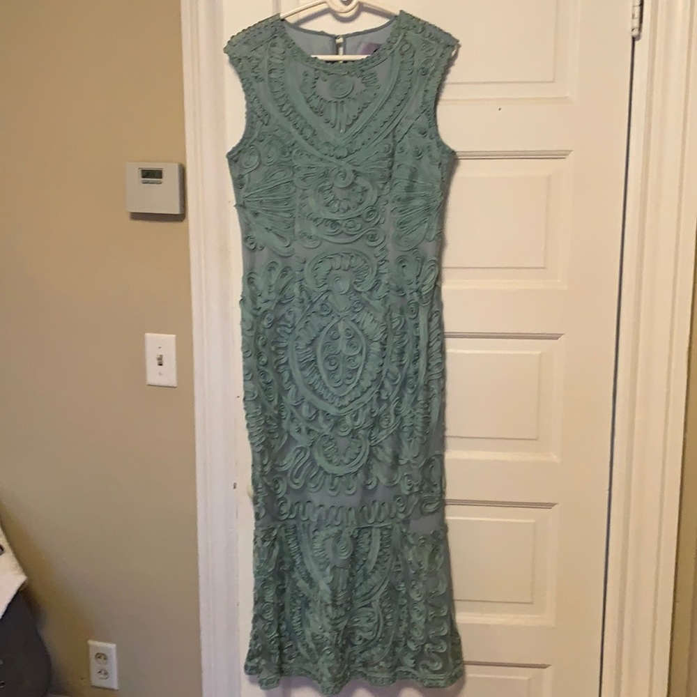 Beautifully embroidered mid calf dress.